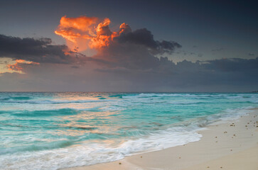 Wall Mural - cloud igniting by morning sunlight above caribbean sea