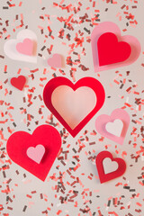 Poster - Heart shapes cut of paper with confetti
