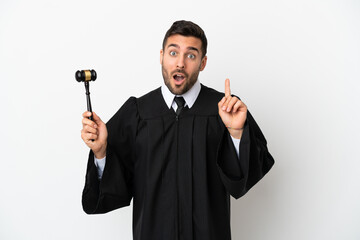 Canvas Print - Judge caucasian man isolated on white background intending to realizes the solution while lifting a finger up