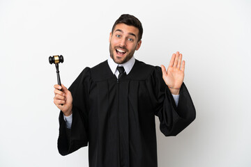 Canvas Print - Judge caucasian man isolated on white background saluting with hand with happy expression