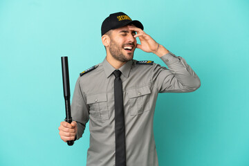 Poster - Young security man isolated on blue background smiling a lot