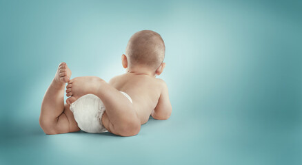 Newborn in the diaper. Isolated	baby.