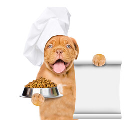 Poster - Funny puppy wearing chef's hat holds bowl of dry dogs food and empty list. isolated on white background