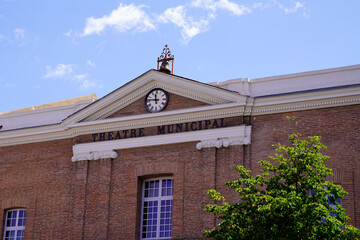 Wall Mural - clock facade of Theatre building in perpignan city France