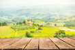 Wooden top for product placement in front of beautiful vineyard landscape