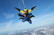 © Sky Antonio - Skydiving. Tandem jump. Two men are flying in the sky.