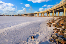 Saint Petersburg Bridges. Russia Winter. Bridge Over Snow-covered River. Winter Day In Saint Petersburg. Large Cable-stayed Bridge Over Bay. Road Architecture Petersburg. Russia In Snow With Blue Sky