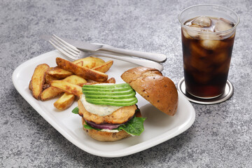 Wall Mural - homemade salmon burger with avocado