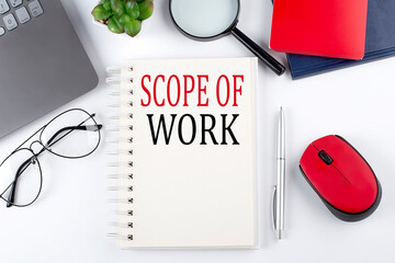 Poster - SCOPE OF WORK text on a notepad with laptop on the white background