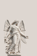 Cover Page With A Beautiful Angel As A Bas Relief Wall Sculpture, Details, Closeup, With Copy Space Solid Background. Concept Of Religion And Religious Architecture.