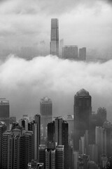 Wall Mural - Skyscraper in downtown of Hong Kong city in fog