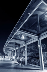 Poster - Empty modern pedestrian walkway in park at night