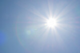 Fototapeta Niebo - Clear blue sky, sun, beautiful sunbeams and glare