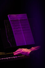 Close-up Of A Man Playing The Piano
