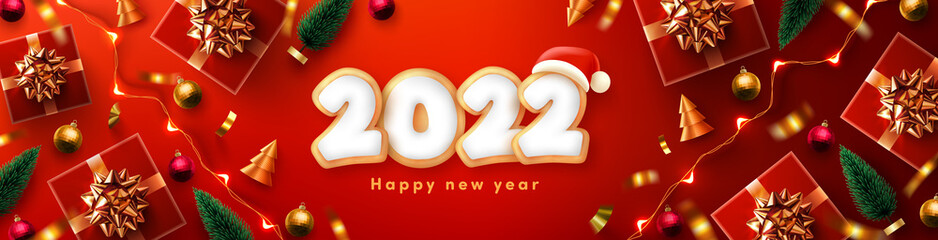 Happy New Year 2022 Poster or banner with Gingerbread cookies in the form of numbers 2022 and christmas element.Banner template for Retail,Shopping,New year or Christmas Promotion.