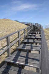  A wooden stairway in the dunes of Petten, the Netherlands, leading to a viewing point
