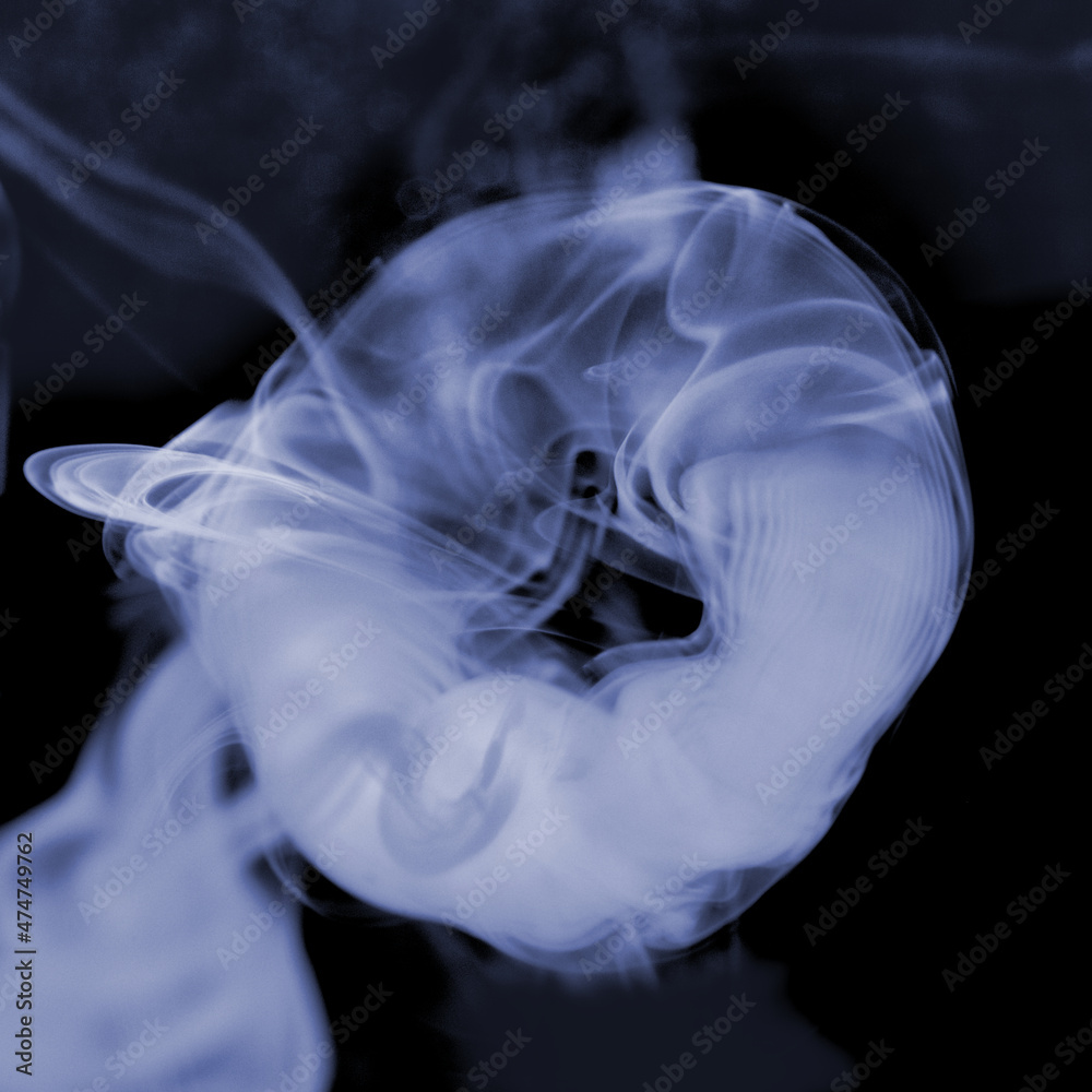 Smoke ring (vape ring) created using a vape pen Stock Photo