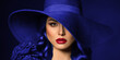 Portrait of a beautiful woman with red lips in a hat, toned in color of the year 2022, very peri.