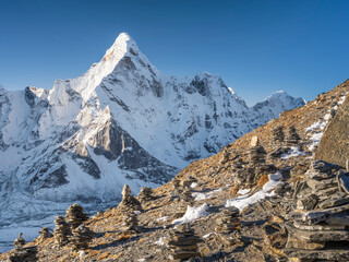 Wall Mural - view to diagonal hill with buddhas prayer stones and himalaya peak ama dablam in nepal
