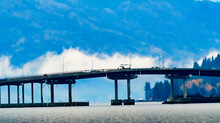 Cars Driving Across Bridge Over Okanagan Lake At Kelowna, Okanagan Valley, British Columbia, Canada