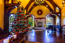 Luxury Residential House Beautifully Decorated For Christmas. The Christmas Tree Matches Well In Style And Color With The Decor Of The Room