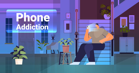 Wall Mural - addicted man using digital gadget guy active in social networks digital addiction concept living room interior