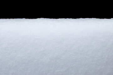 Wall Mural - white snow in daylight, background, isolate on black background