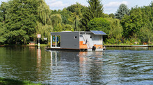 With The Houseboat On The River Dahme In Brandenburg. Relaxed Sailing With The Boat.