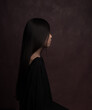 © Milou Dirks - classic studio portrait of child with long black hair seen from side in renaissance style