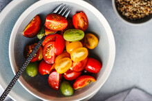 Bowl Of Cherry Tomato Salad With Sunflower Seeds
