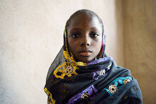 Portrait Of Malian Girl Portrait Looking To Camera