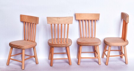 set of wooden chairs isolated on white background