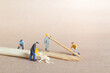 Miniature people carpenter making bamboo toothpick from bamboo, Recycle concept