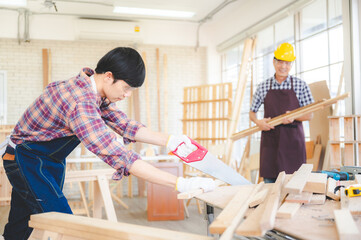 wooden workshop concept, carpenter team craftsman person working with a wood work construction tool