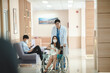 © chokniti - medical activity in hospital, professional doctor person talking with team or patient together