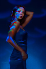 Portrait In The Style Of Light Painting. Brunette Woman In Blu Dress Long Exposure Photo, Abstract Portrait Light And Freezelight Background
