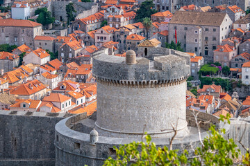 Wall Mural - Minceta tower at old city Dubrovnik with the town red and orange roofs in the background