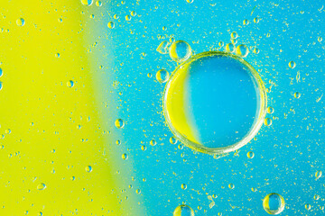 Wall Mural - psychedelic blueand yellow oil and water abstract background. abstract colorful background. foam of 