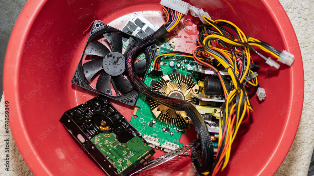 In a wash basin for electronics spare parts. Top view Computer hardware ...