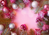 Fototapeta  - Beautiful festive theme for Christmas in rose gold colors on a bokeh background