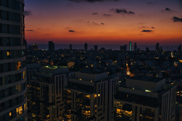 Fototapete - Beautiful Cityscape with Sun Reflections on Buildings of Tel Aviv, Israel under amazing Skies.