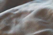 Closeup Texture Of A Polyester Microfiber Screen Cleaning Cloth With A Detailed Pattern Of Shiny Woven Threads