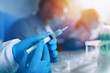 Leinwandbild Motiv Medical study of vaccine against covid-19 virus infection