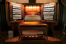A Traditional Pipe Organ Illuminated With Lights