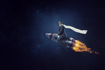 Businessman on a rocket . Mixed media