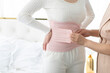 © Blue Jean Images - Confinement nurse taking care of young woman