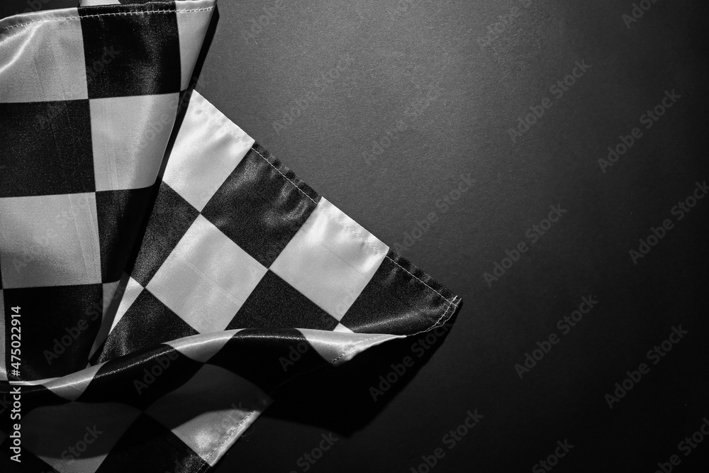 Racing flag on black background