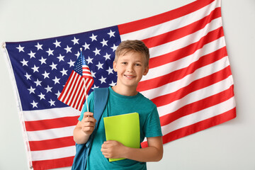 Sticker - Pupil of language school near light wall with USA flag