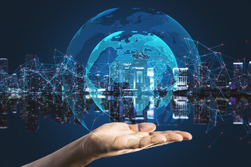 Poster - Close up of hand holding creative glowing globe with polygonal connections on blurry blue night city background. Big data, technology, futuristic world and business concept. Double exposure.