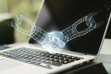 Poster - Creative concept of blockchain technology with handshake on modern laptop background. digital money transfers and decentralization concept. Multiexposure